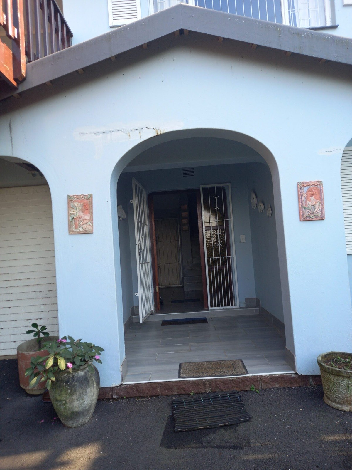 The arched front entrance to the house
